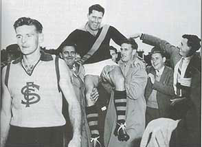 link to photo of Fred Pemberton carried off the ground  after 1959 first semi final win